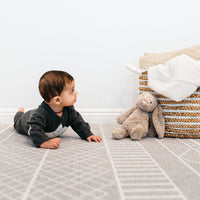 The Cali Rug in Neutral Grey • Two-Sided, Memory Foam Play Mat with Modern, Boho-Inspired Designer Rug Pattern